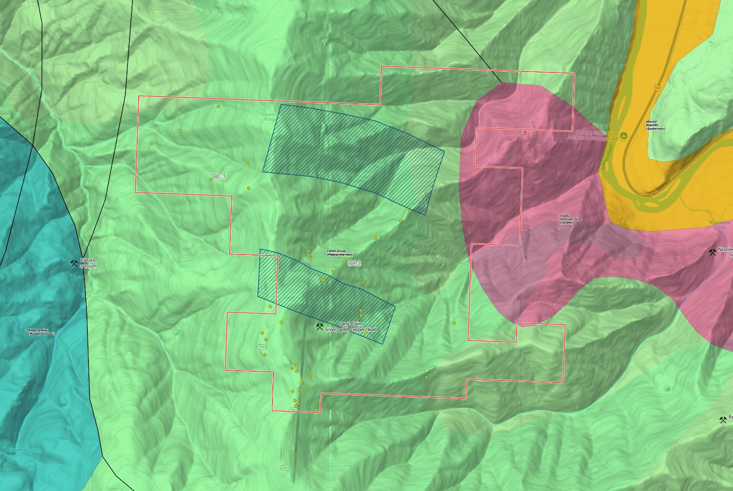 Map of the inferred porphyry footprint: two hatched historic IP anomalies between holes BC-1 and BC-2, with historic drill collars, the Eocene Challis intrusive rocks to the east and an earlier claim outline